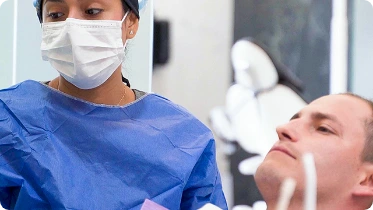 doctor examining patient in the dental clinic in los algodones