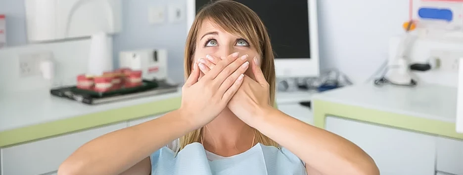 Common causes of dental phobia, including fear of pain, needles, and past traumatic dental experiences